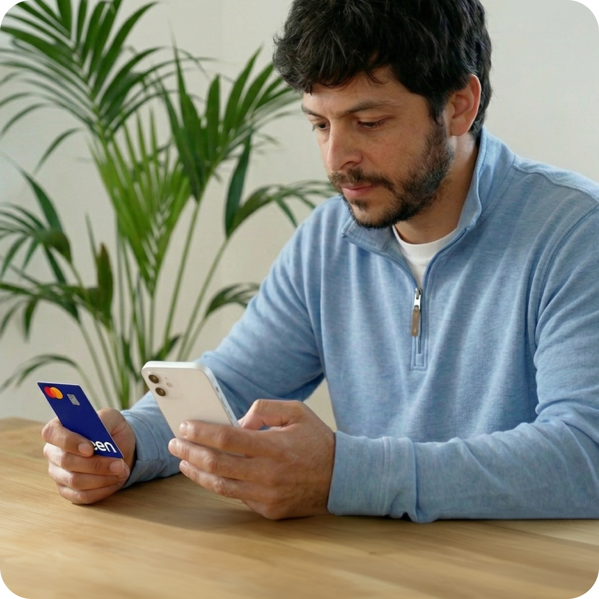Person reviewing their Seen credit building account