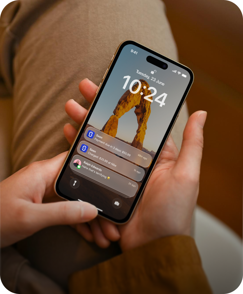 Phone receiving real-time account alerts